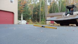 (#1): Example of a damaged driveway.